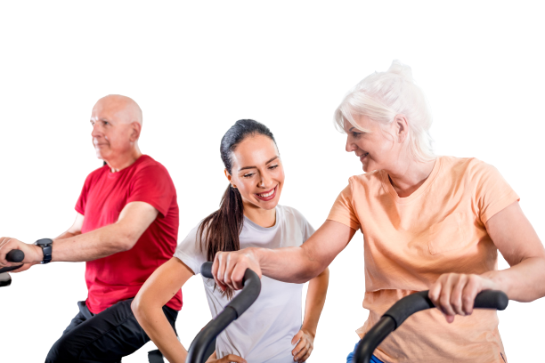 senior couple biking at the gym with personal trai 2021 08 30 00 36 03 utc min removebg preview